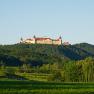 Stift Göttweig hoch oben am Berg, © Bernhard Rameder Blick auf das Stift Göttweig auf einem bewaldeten Hügel.